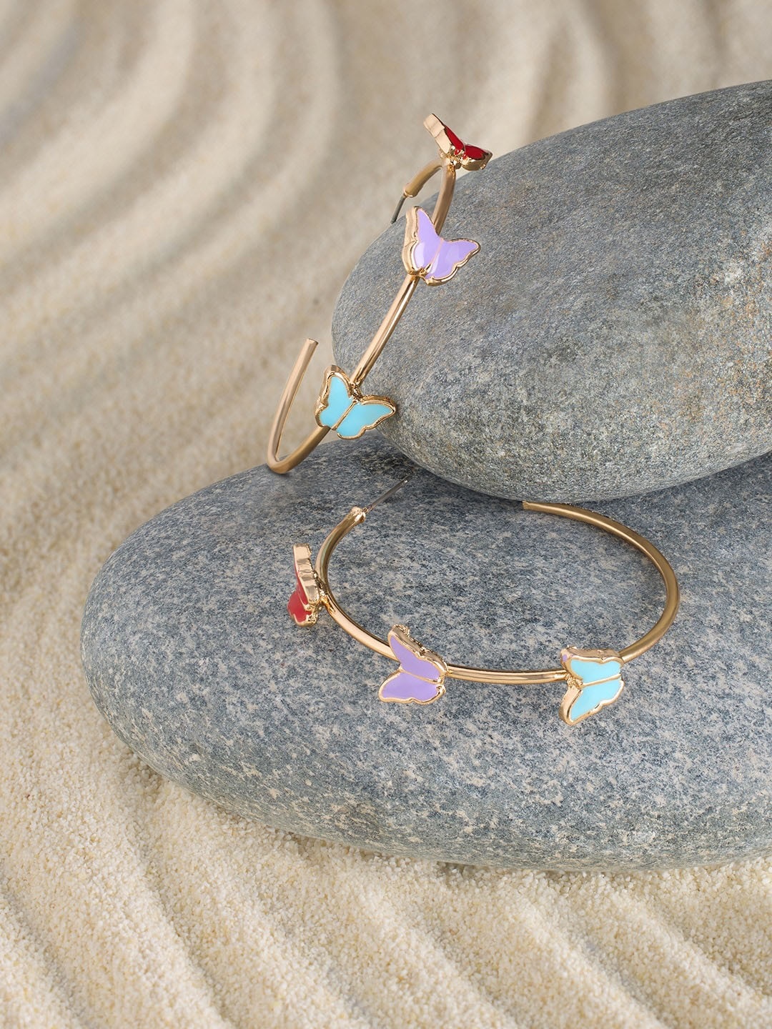 

AMI Gold Plated Circular Half Hoop Earrings