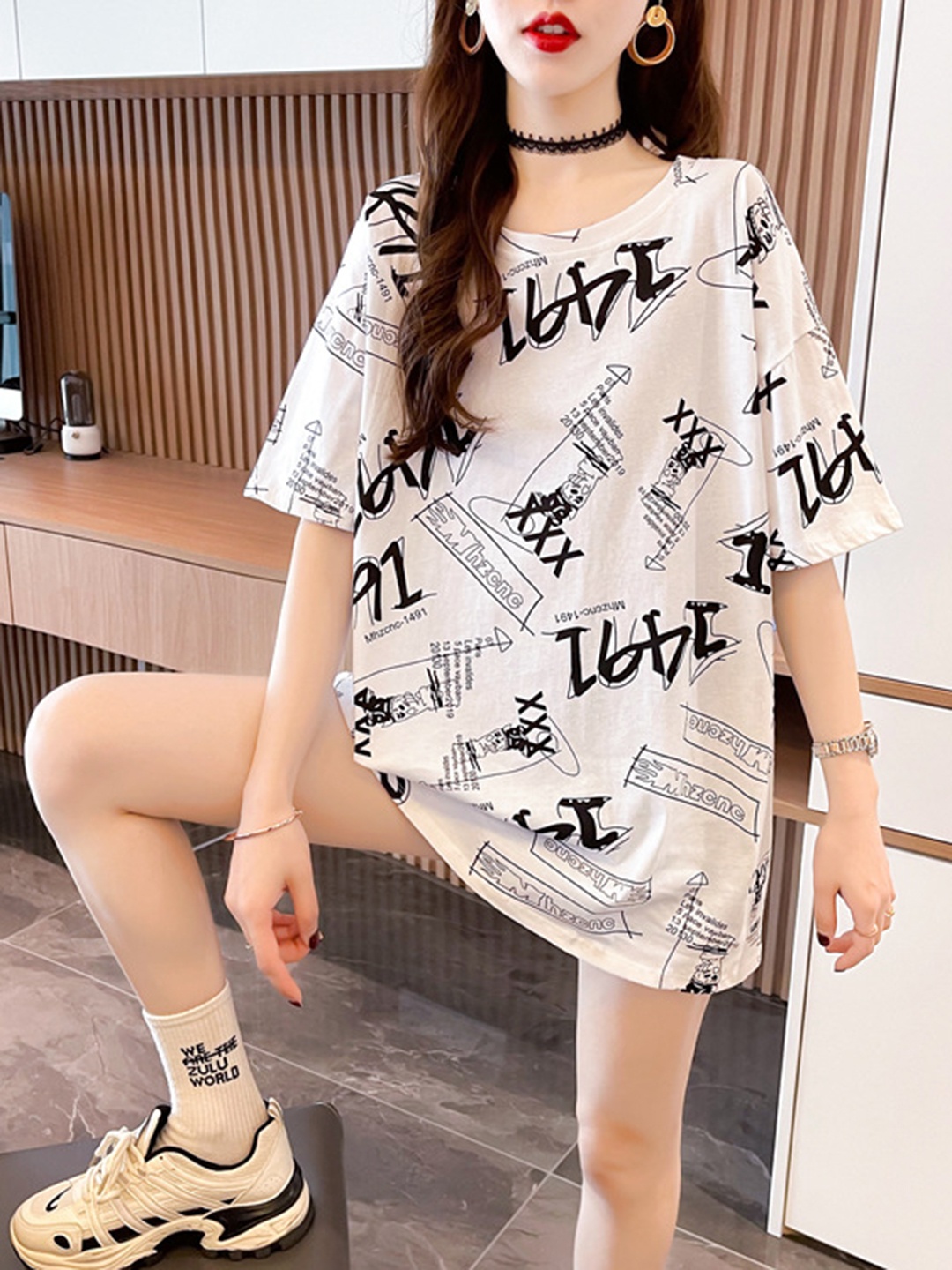 

StyleCast White Typography Printed Knitted Top