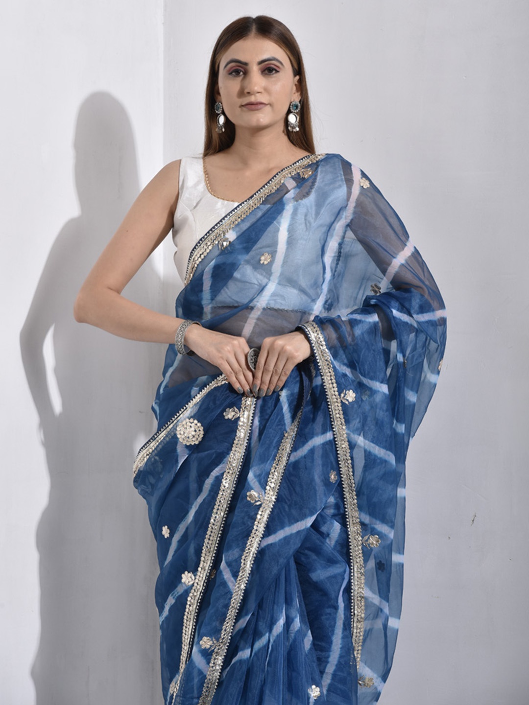 

sutra attire Floral Leheriya Embellished Tissue Saree, Blue