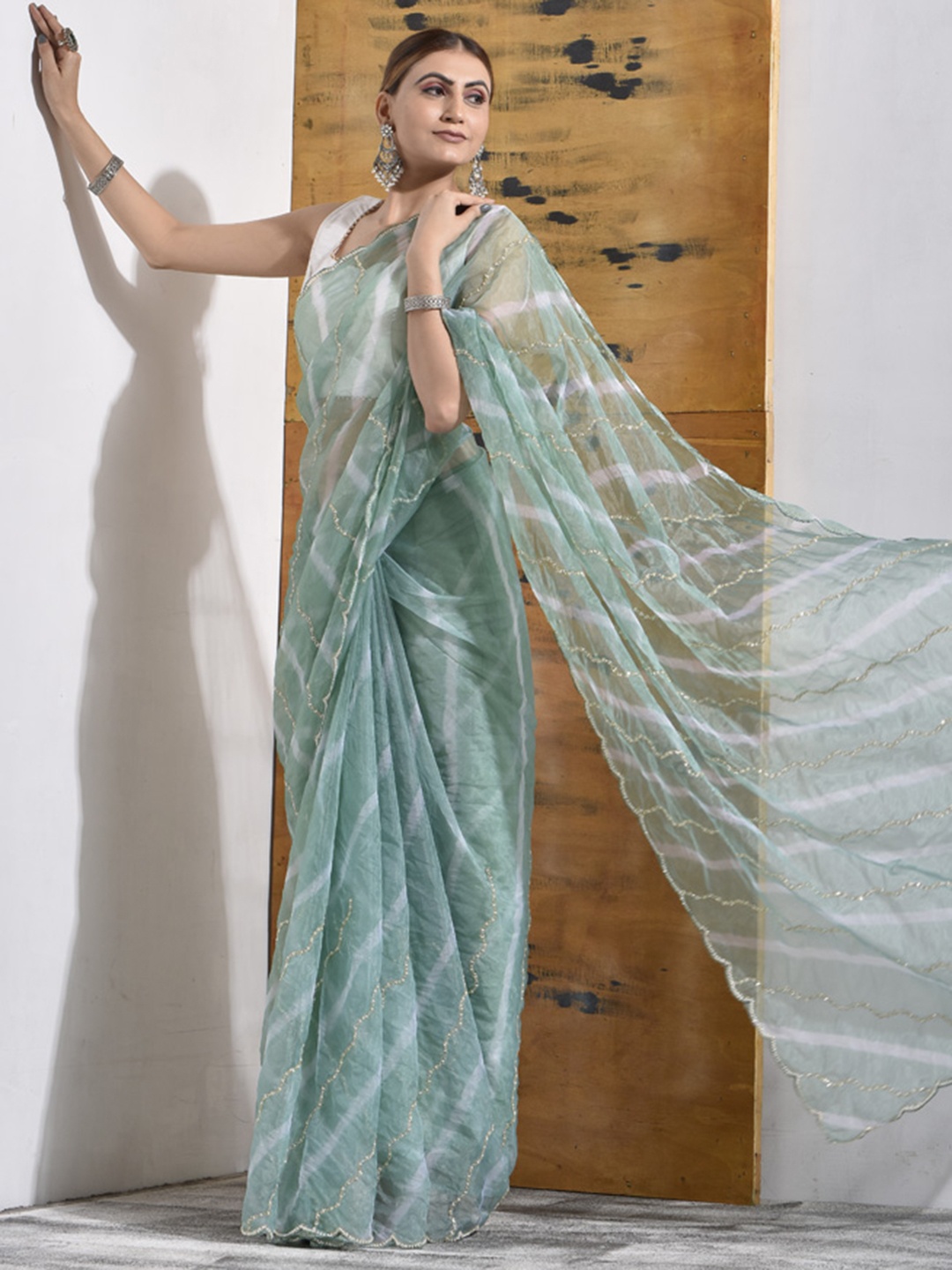 

sutra attire Leheriya Printed Pure Chiffon Saree, Green
