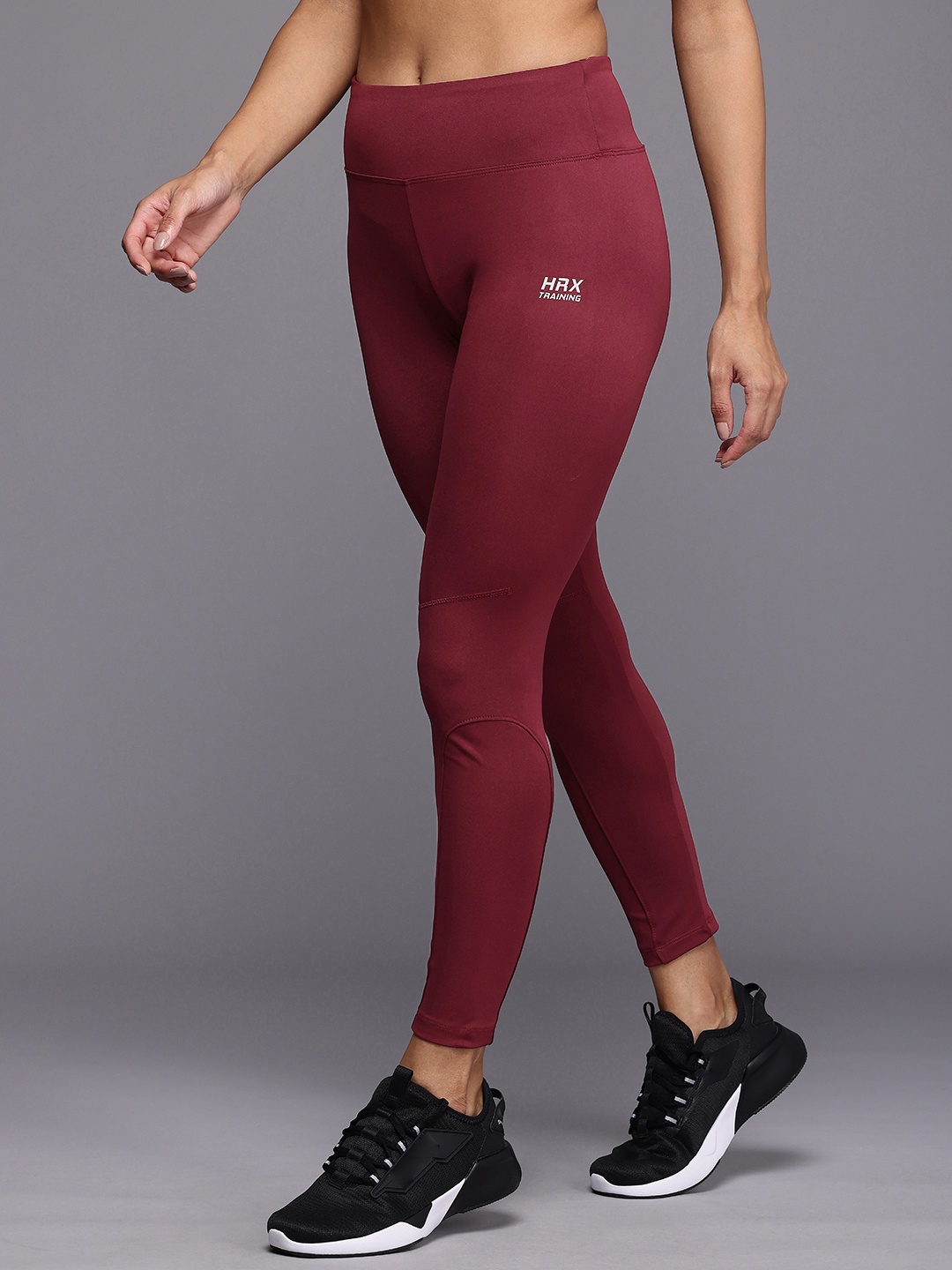 

HRX by Hrithik Roshan Women Antimicrobial & Rapid Dry High Rise Slim Fit Training Tights, Maroon