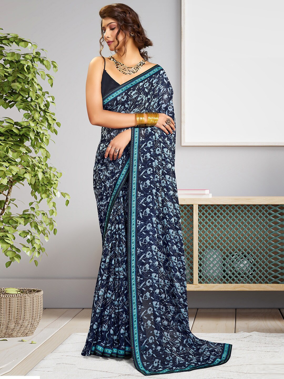 

SANSKAR Floral Printed Georgette Saree, Blue