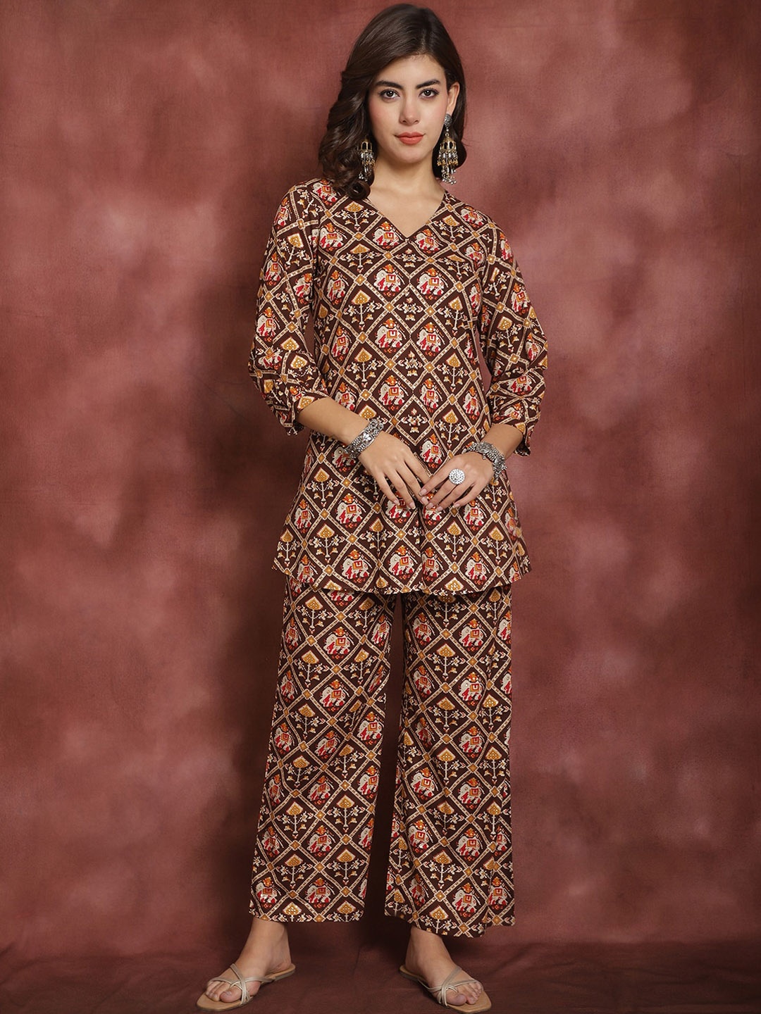 

Prakrti Brown Ethnic Motifs Printed V-Neck Pure Cotton Tunic With Trouser