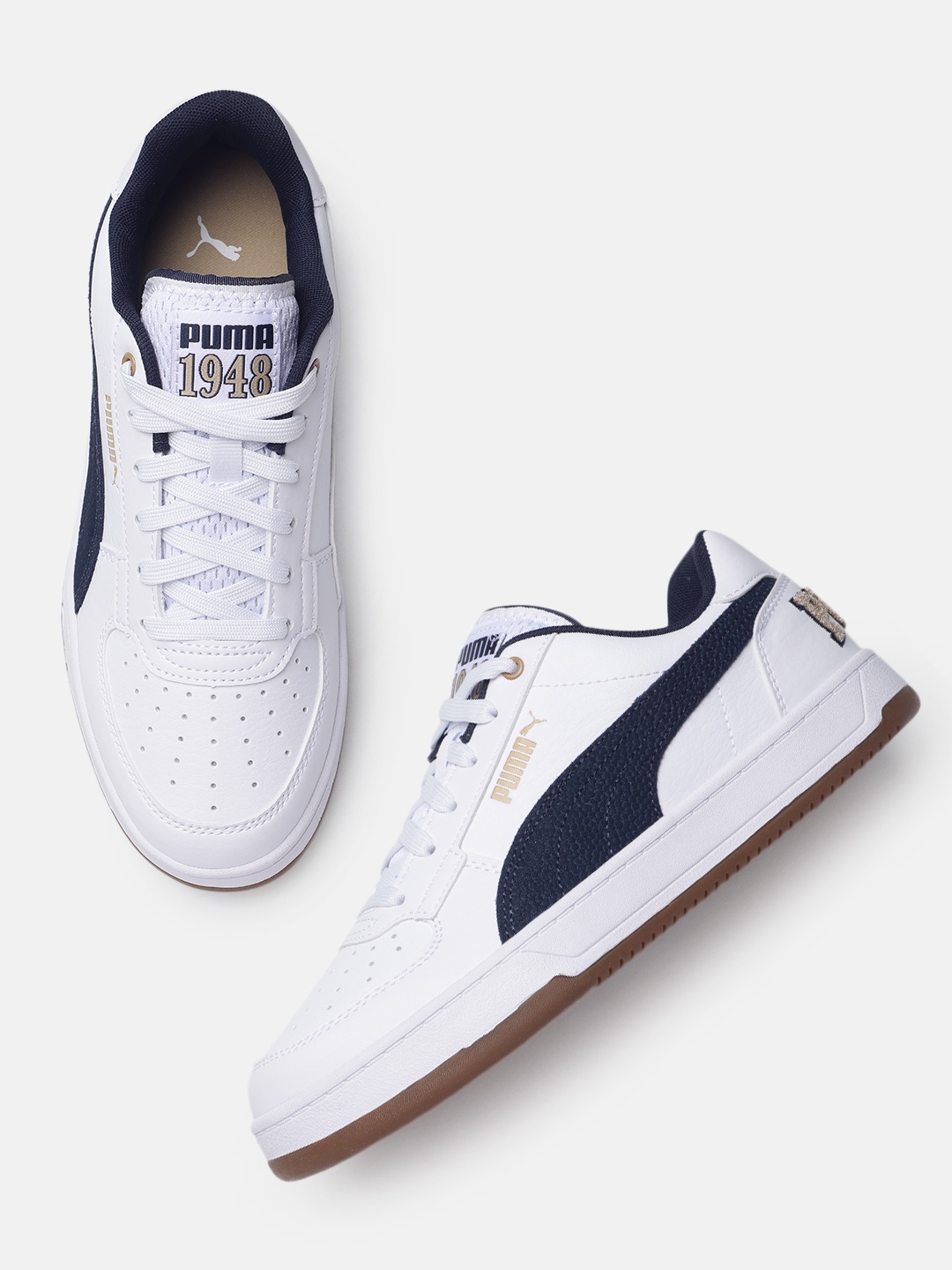 

Puma Unisex Perforations Caven 2.0 Retro Club Sneakers, White