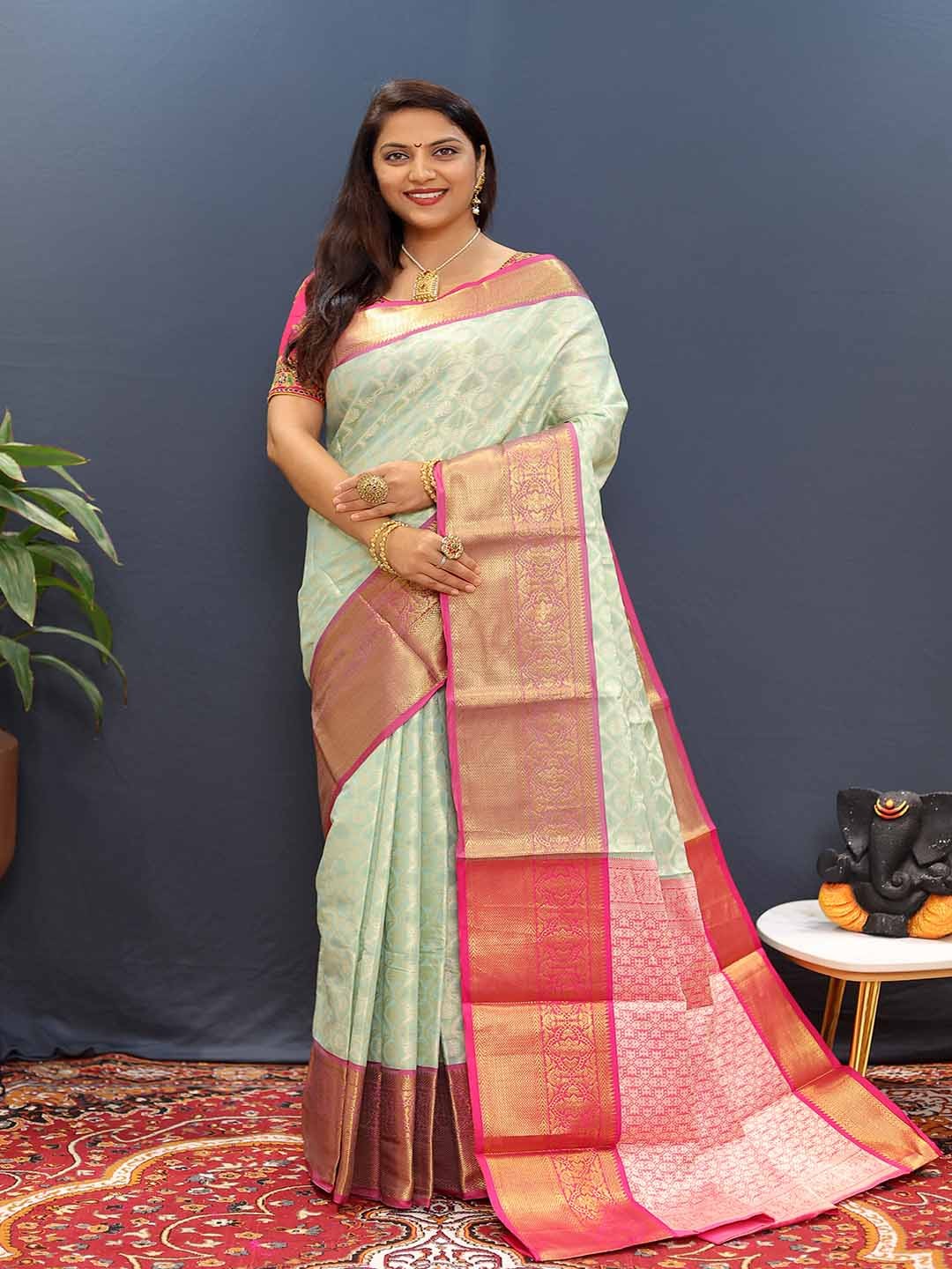 

KALINI Ethnic Motifs Woven Design Zari Saree, Green