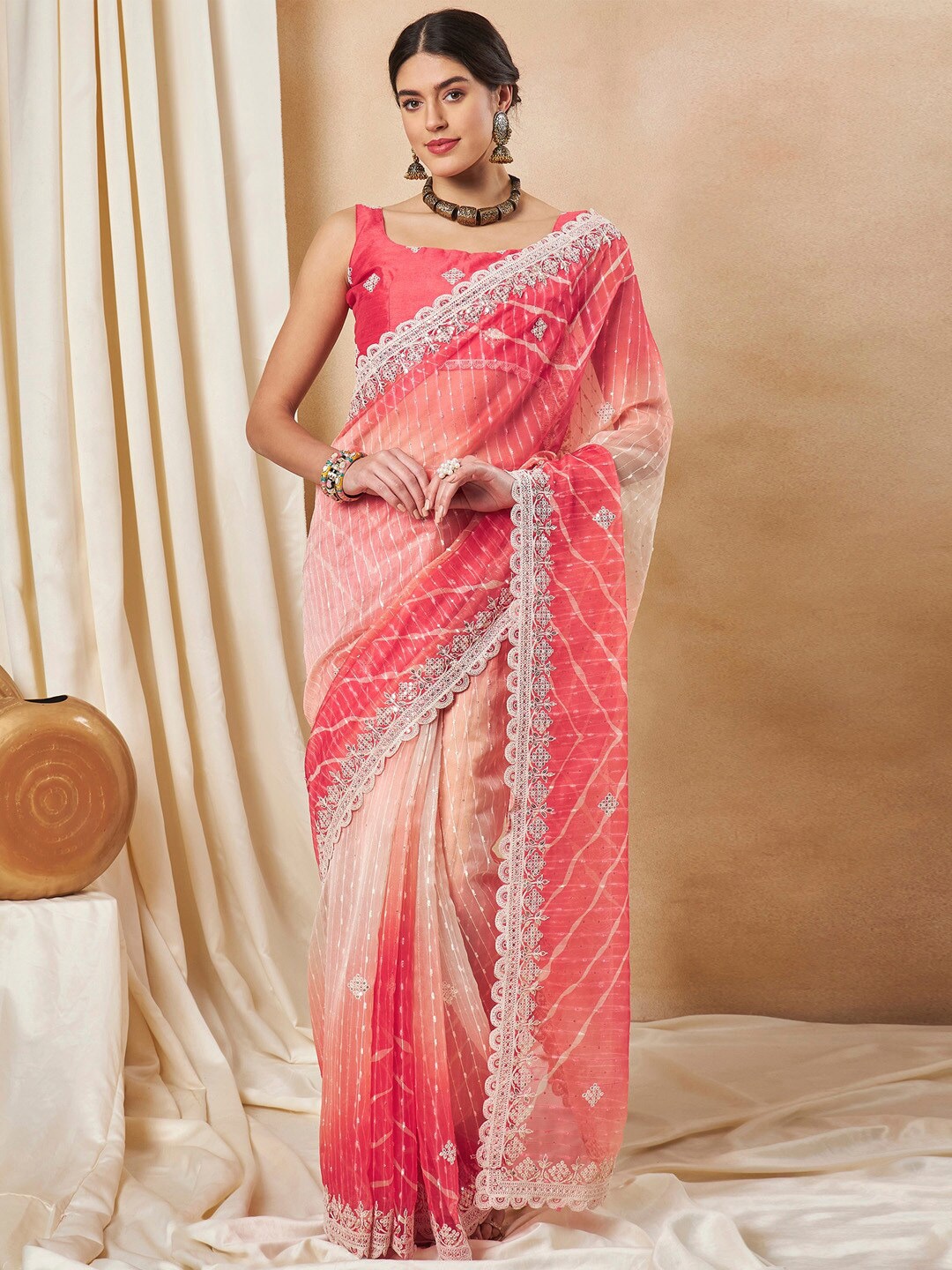 

Saree mall Red Sequinned Embellished Net Saree