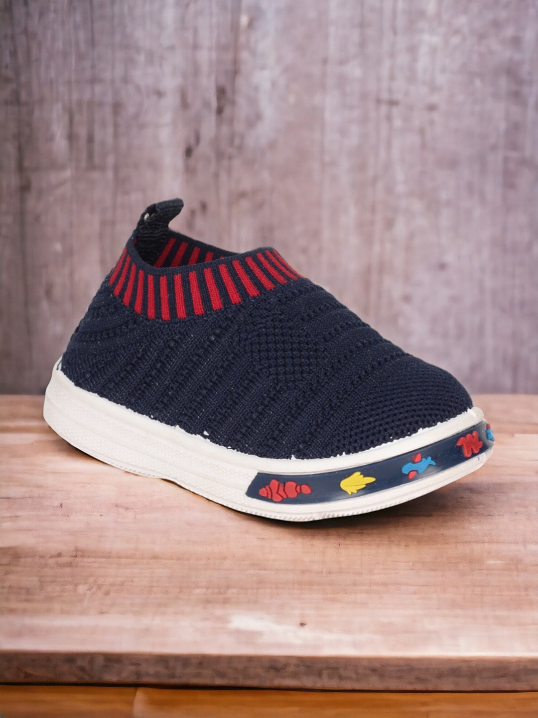 

Lil Lollipop Kids Textured Comfort Insole Contrast Sole Musical Slip-On Sneakers, Navy blue
