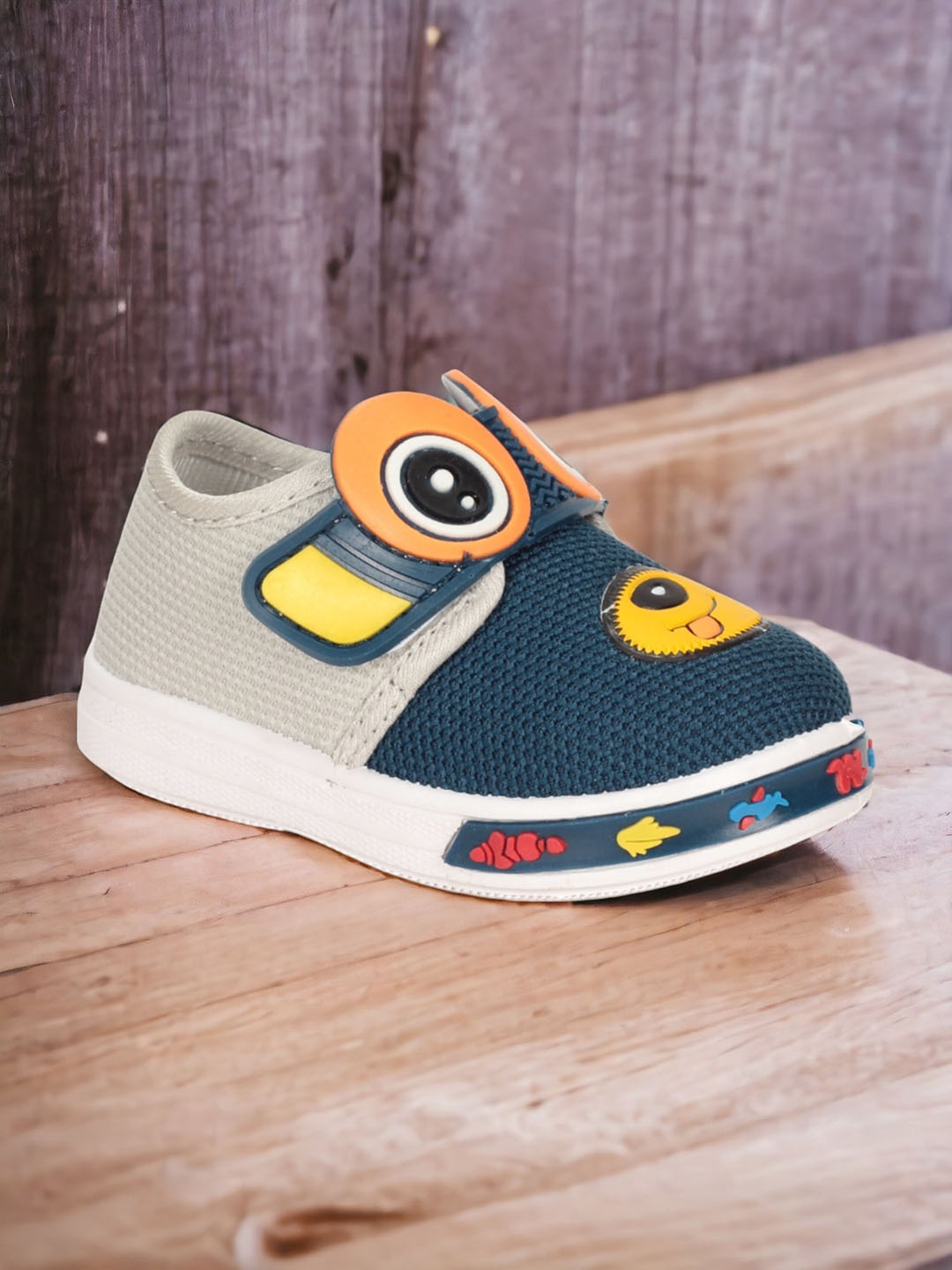 

Lil Lollipop Kids Colourblocked Musical Sneakers, Teal