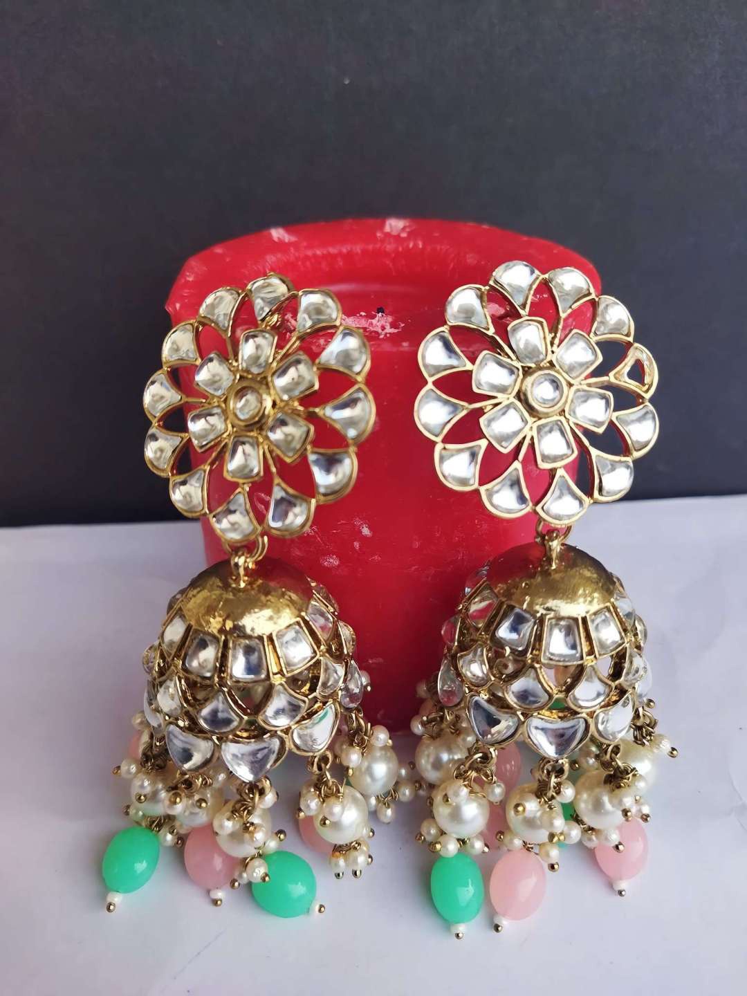

Crunchy Fashion Gold-Plated Kundan Dome shaped Jhumkas Earrings