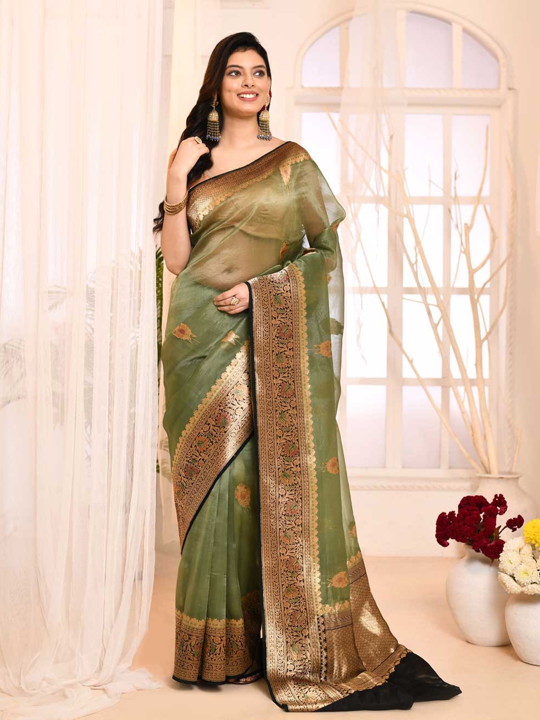 

Rasm by Muskaan Ethnic Motifs Woven Design Zari Organza Banarasi Saree, Green