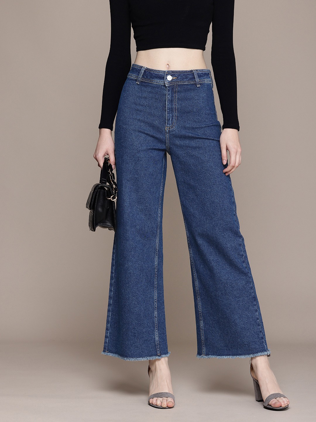 

MANGO Women Loose Fit High-Rise Light Fade Stretchable Jeans, Blue