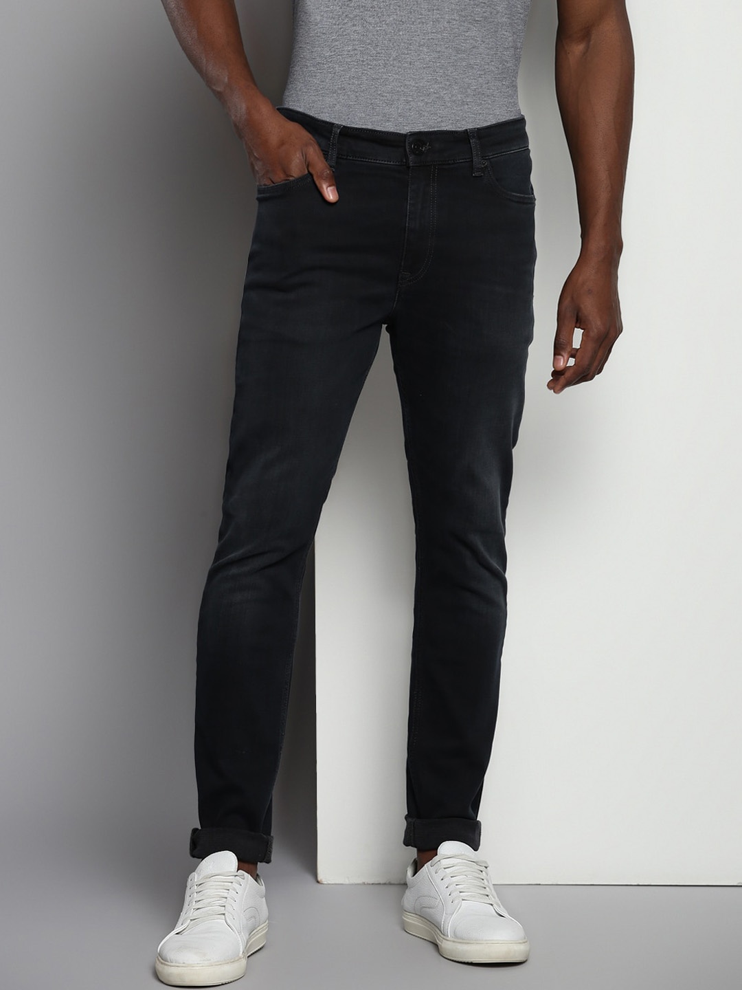 

Tommy Hilfiger Men Skinny Fit Light Fade Clean Look Cotton Jeans, Black