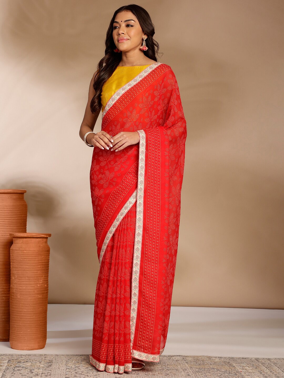 

Anouk Rustic Bandhani Pure Georgette Saree, Yellow