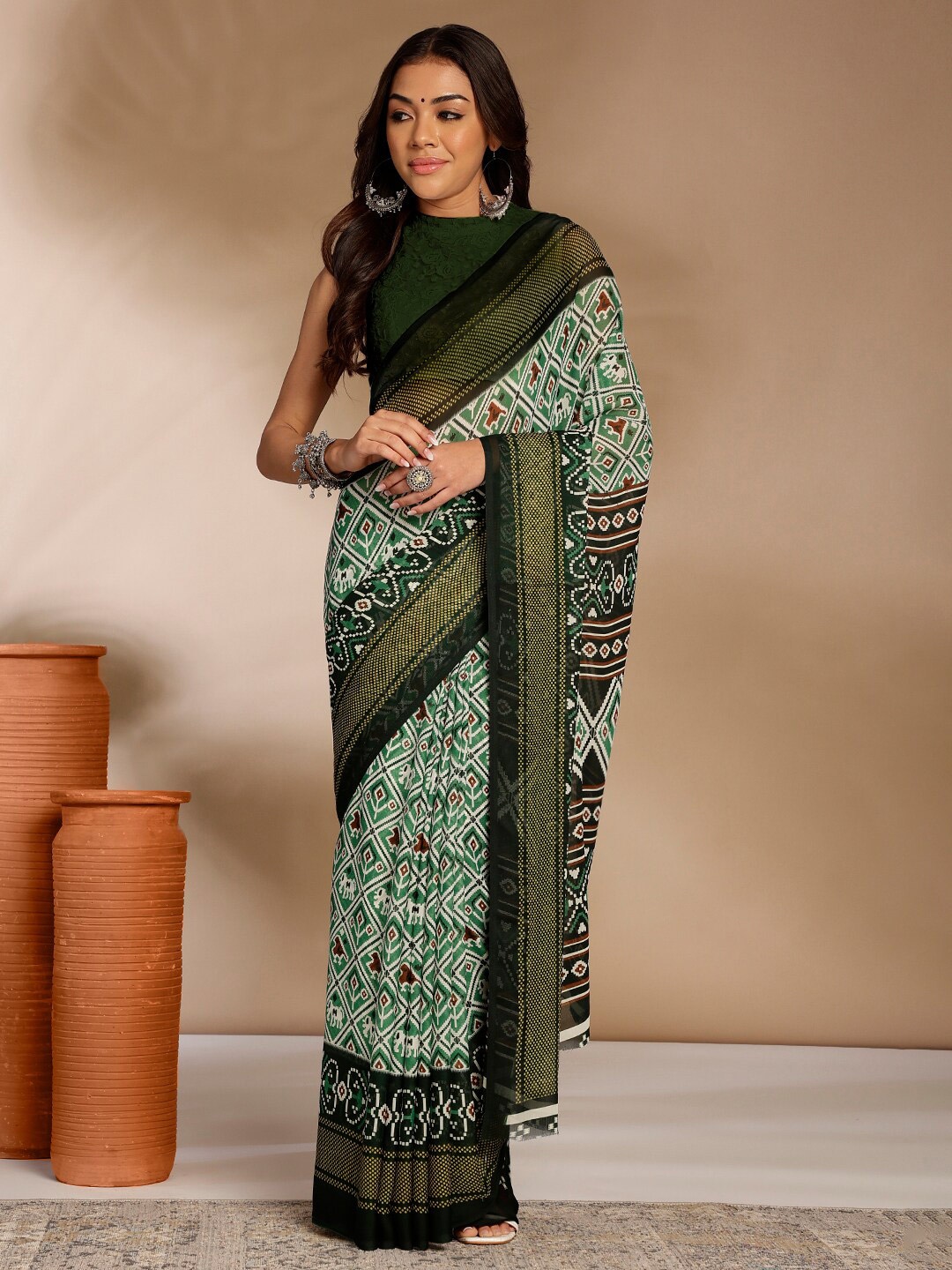 

Anouk Rustic Ethnic Motifs Printed Pure Georgette Zari Saree, Green
