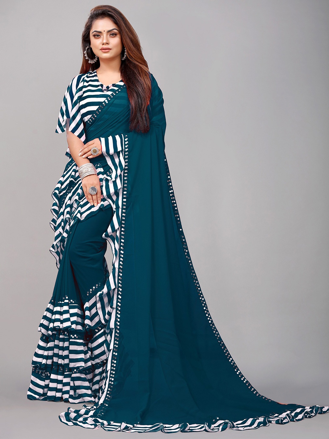 

Reeta Fashion Striped Mirror Work Pure Georgette Saree, Teal