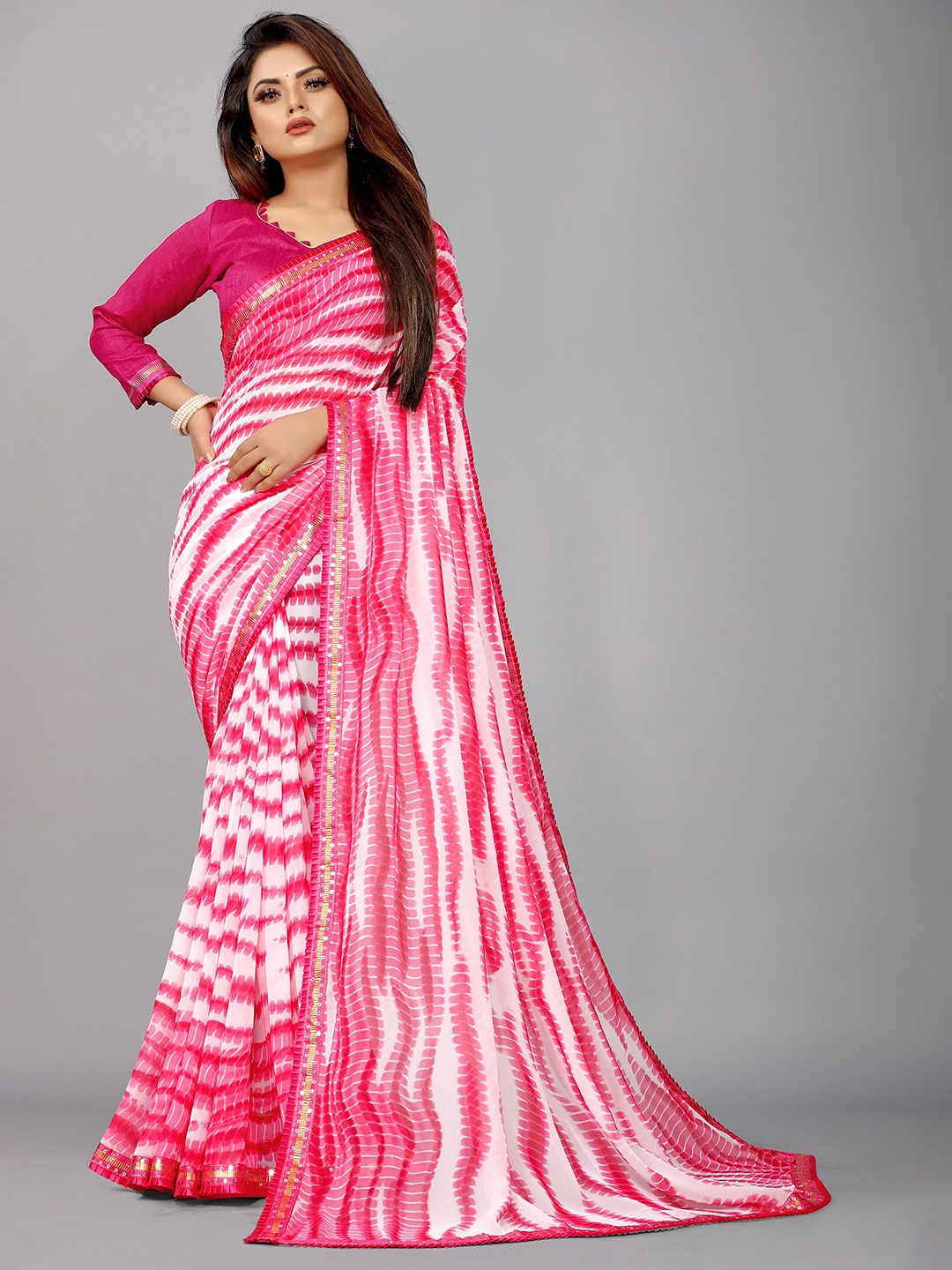 

Reeta Fashion Abstract Printed Sequinned Pure Georgette Saree, Pink