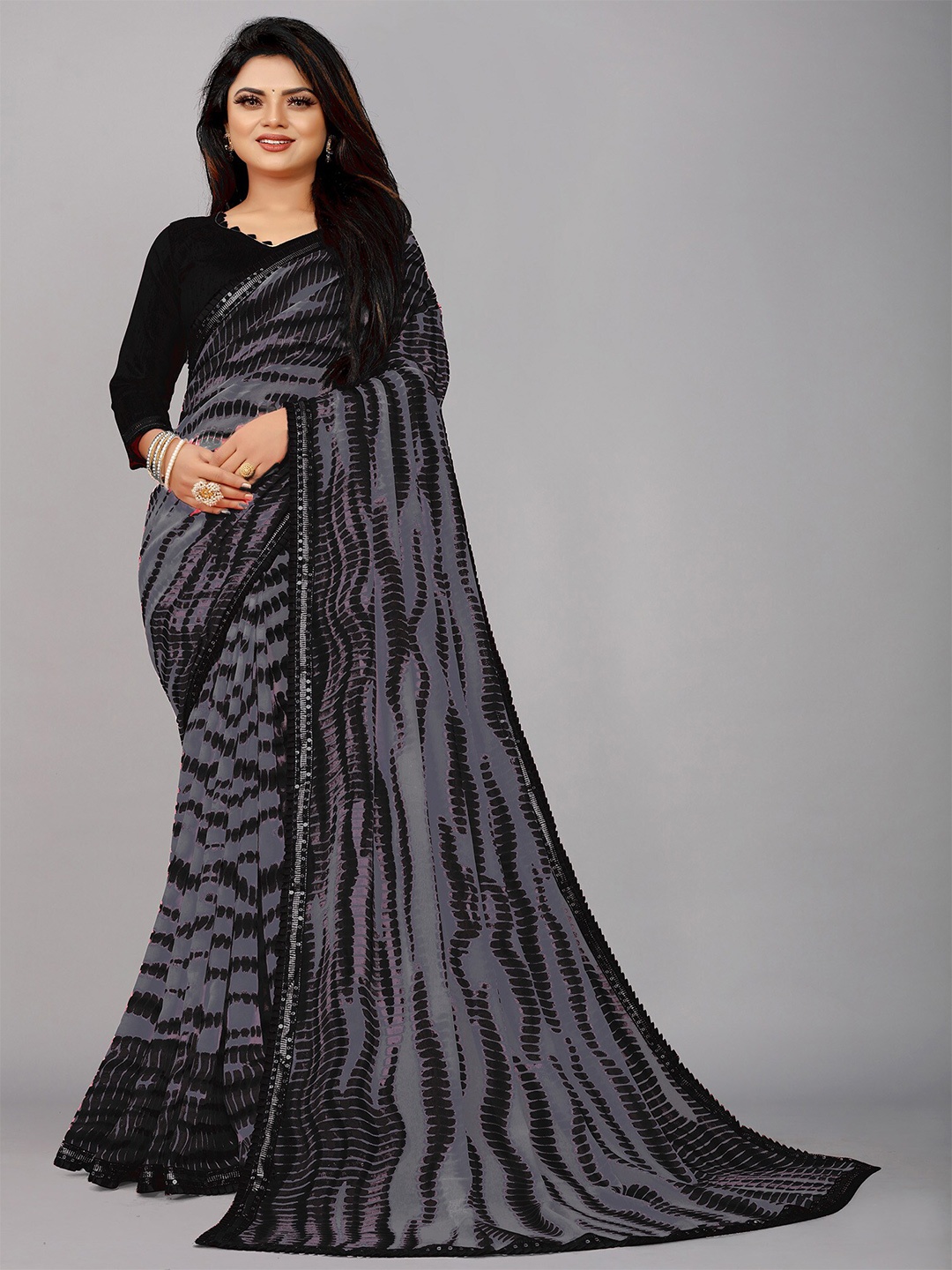 

Reeta Fashion Abstract Printed Sequinned Pure Georgette Saree, Grey