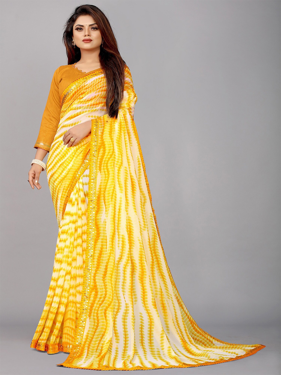 

Reeta Fashion Abstract Printed Sequinned Pure Georgette Saree, Yellow