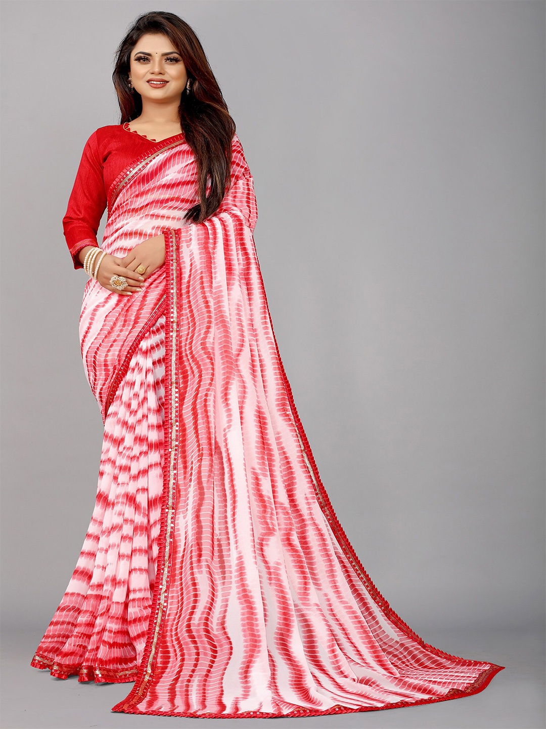 

Reeta Fashion Abstract Printed Sequinned Pure Georgette Saree, Red