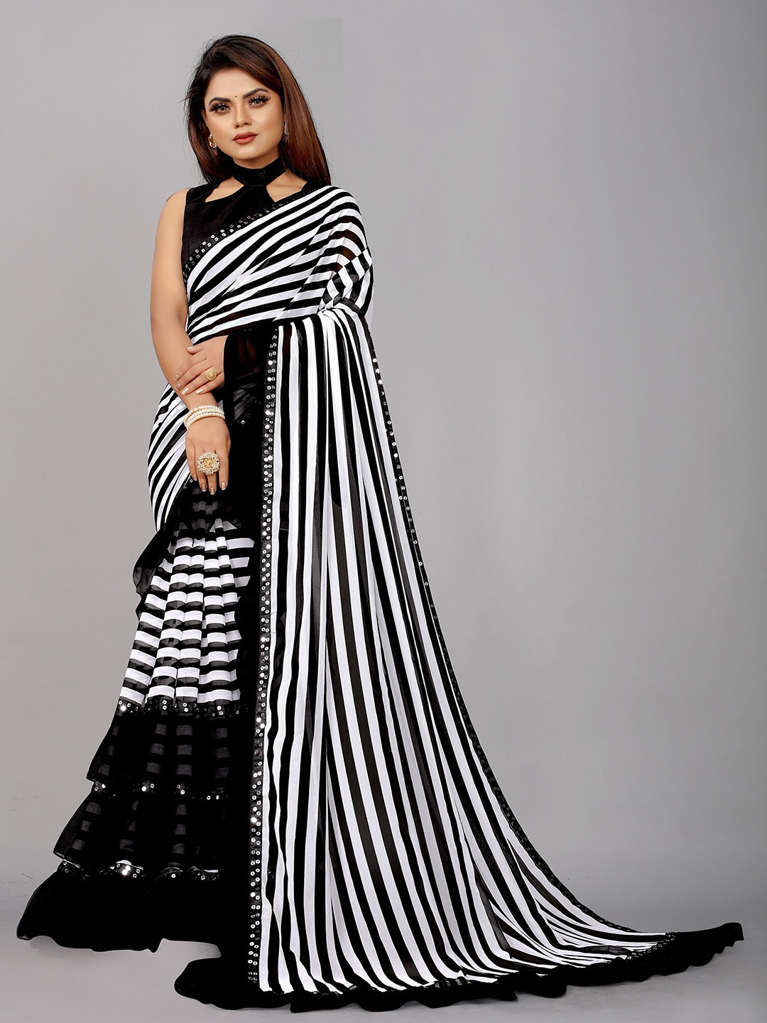 

Reeta Fashion Striped Sequinned Ruffles Pure Georgette Saree, White
