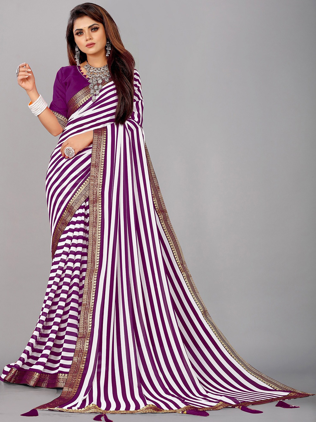 

Reeta Fashion Striped Zari Pure Georgette Saree, Purple