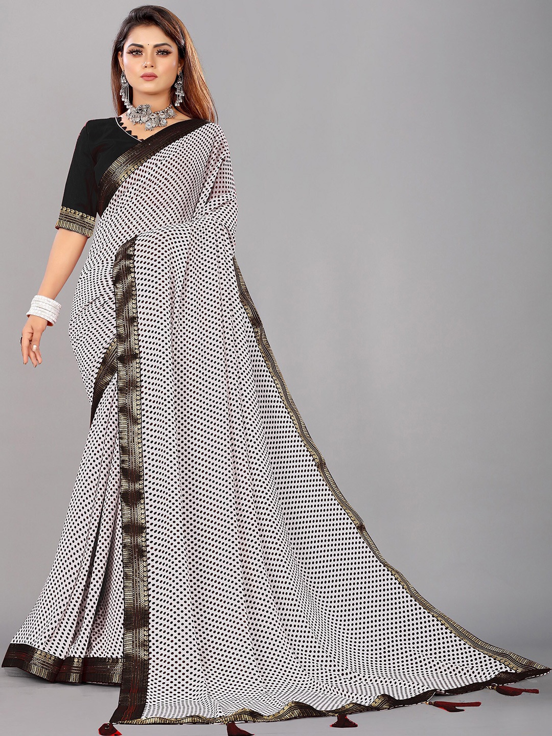 

Reeta Fashion Polka Dots Zari Pure Georgette Saree With Tassels Detail, Black
