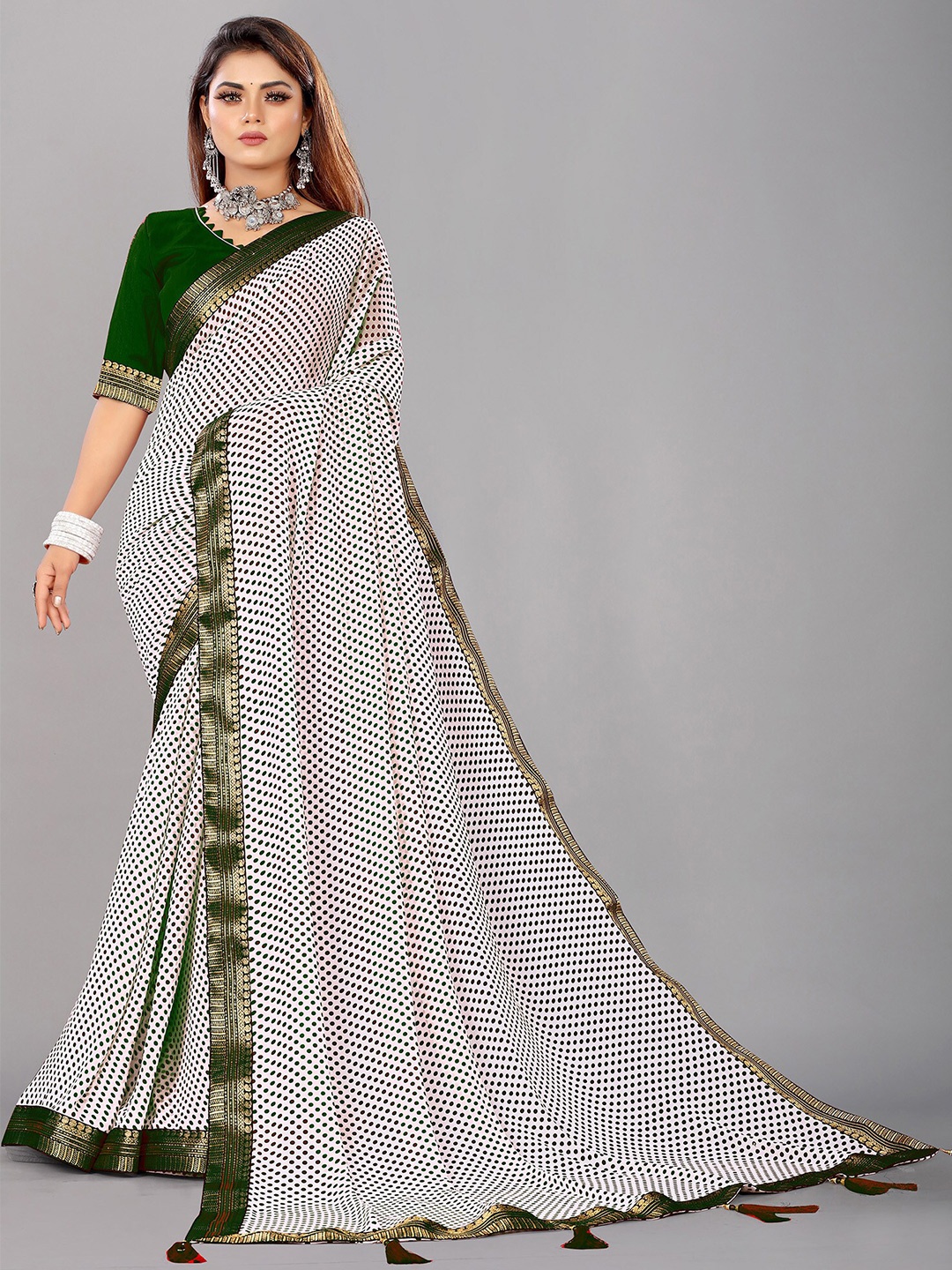 

Reeta Fashion Polka Dots Zari Pure Georgette Saree With Tassels Detail, Green