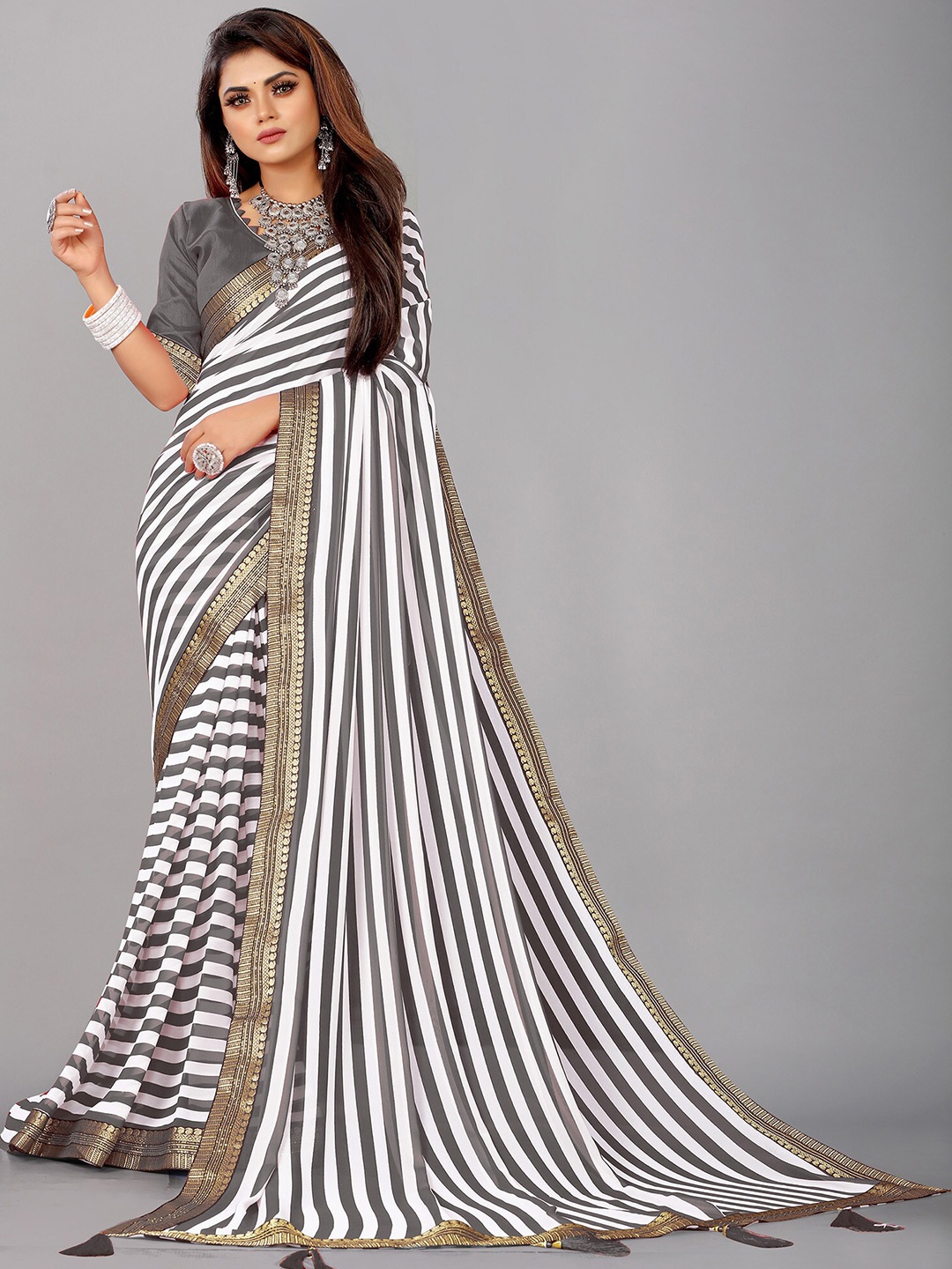

Reeta Fashion Striped Zari Pure Georgette Saree, Grey