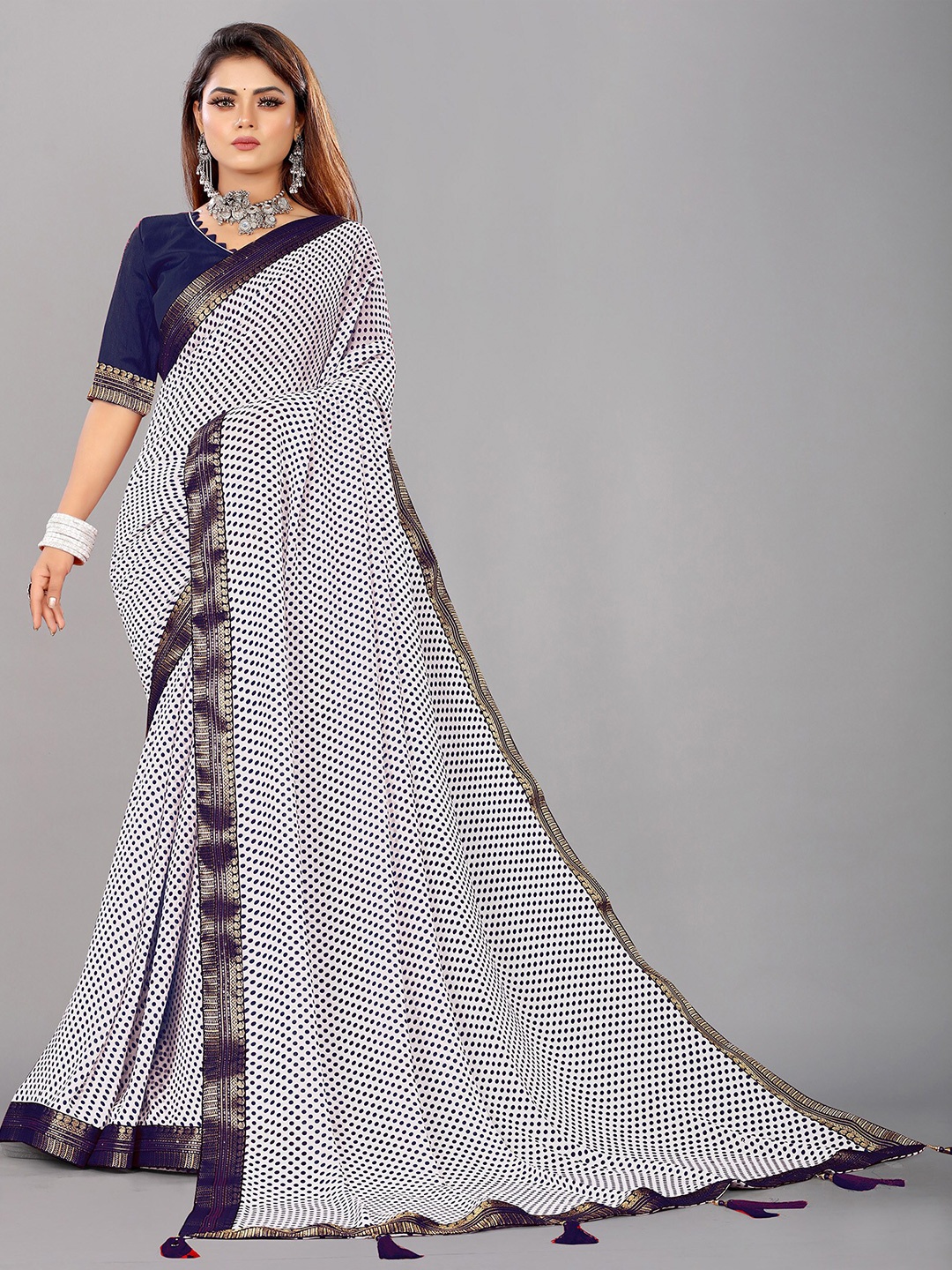 

Reeta Fashion Striped Zari Pure Georgette Saree, Navy blue