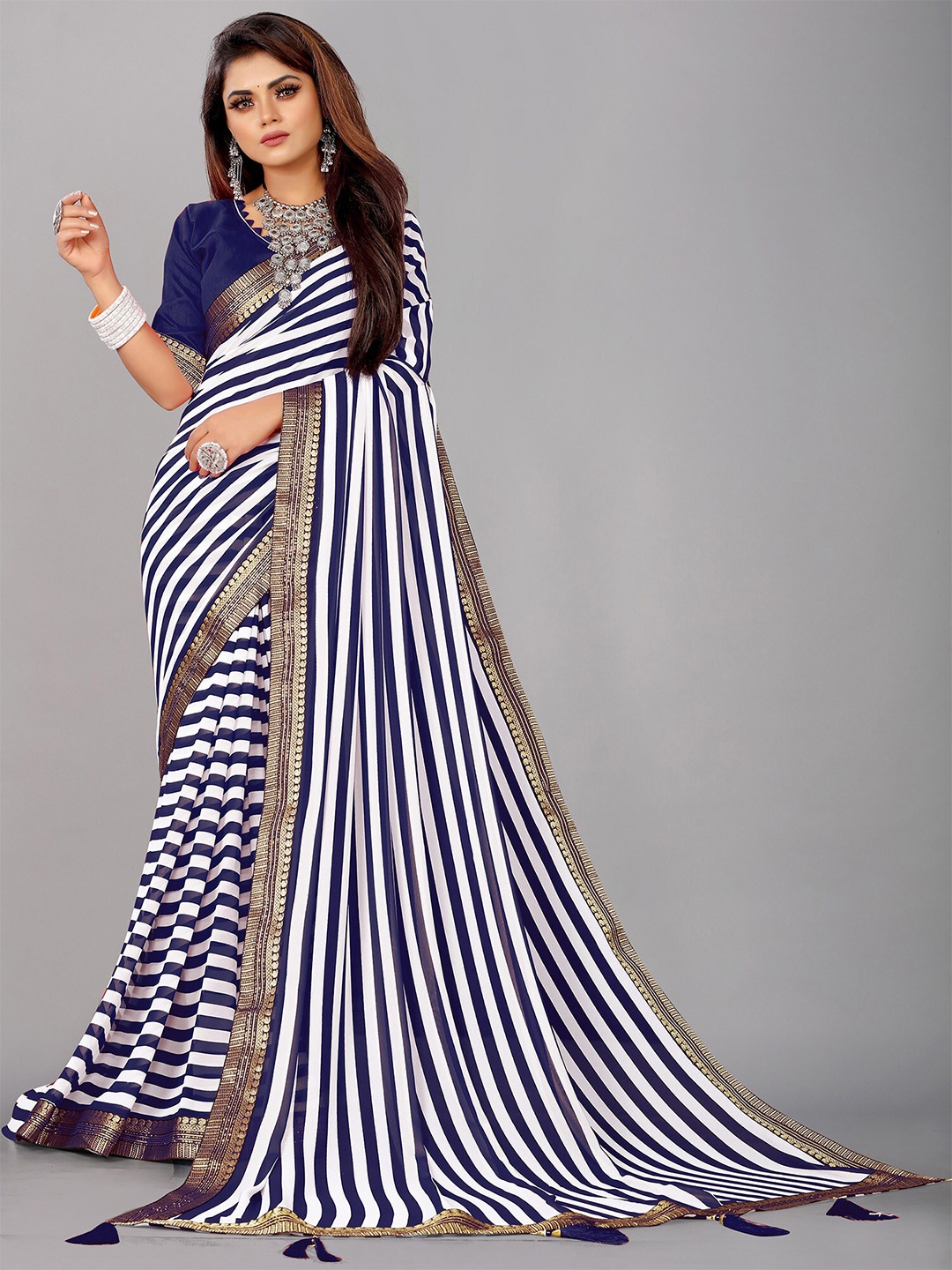 

Reeta Fashion Striped Zari Pure Georgette Saree, Navy blue