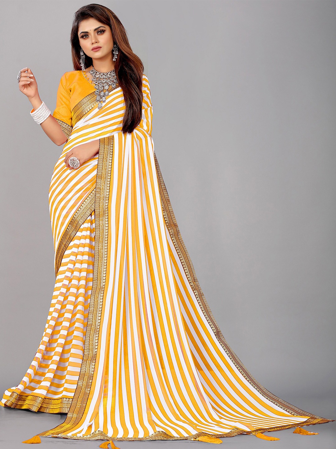 

Reeta Fashion Striped Zari Pure Georgette Saree, Yellow