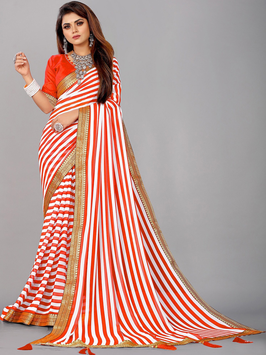 

Reeta Fashion Striped Zari Pure Georgette Saree, Orange