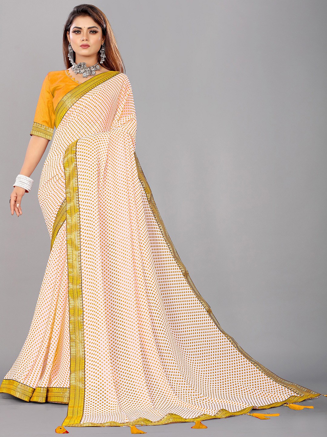 

Reeta Fashion Polka Dots Zari Pure Georgette Saree With Tassels Detail, White
