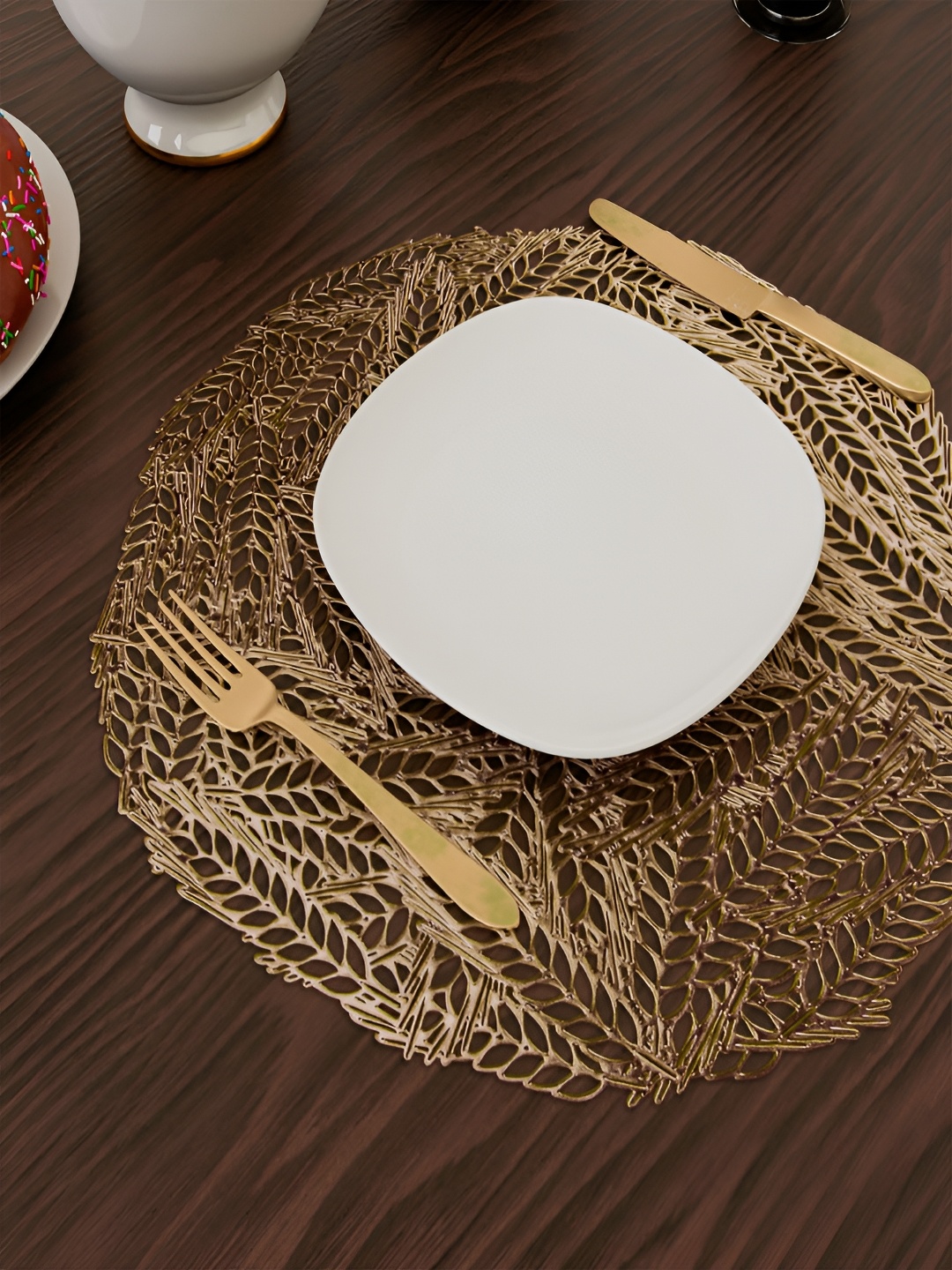 

Kuber Industries Gold Toned 6 Pcs Leaf-Design Round Table Placemats