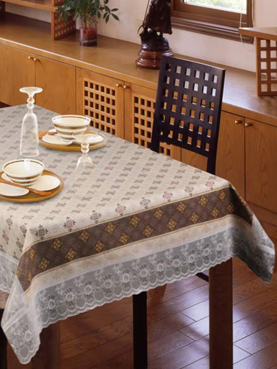 

Freelance Brown & White Floral Printed Waterproof Highly Durable 6-Seater Table Cover