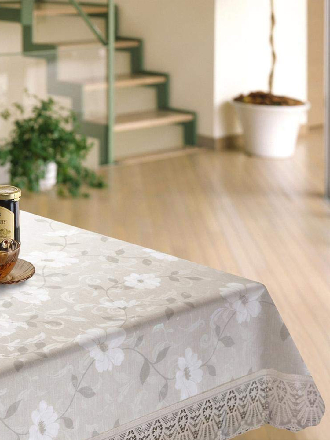 

Freelance Cream & White Floral Printed Waterproof Crack Resistant 2-Seater Table Cover