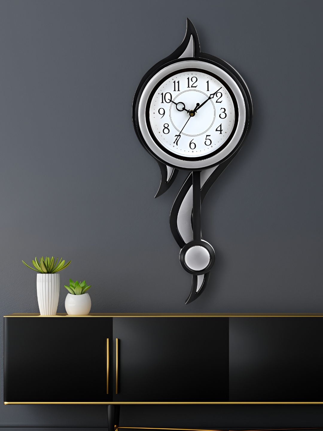 

Attractionz Silver-Toned Round Analogue Pendulum Contemporary Wall Clock