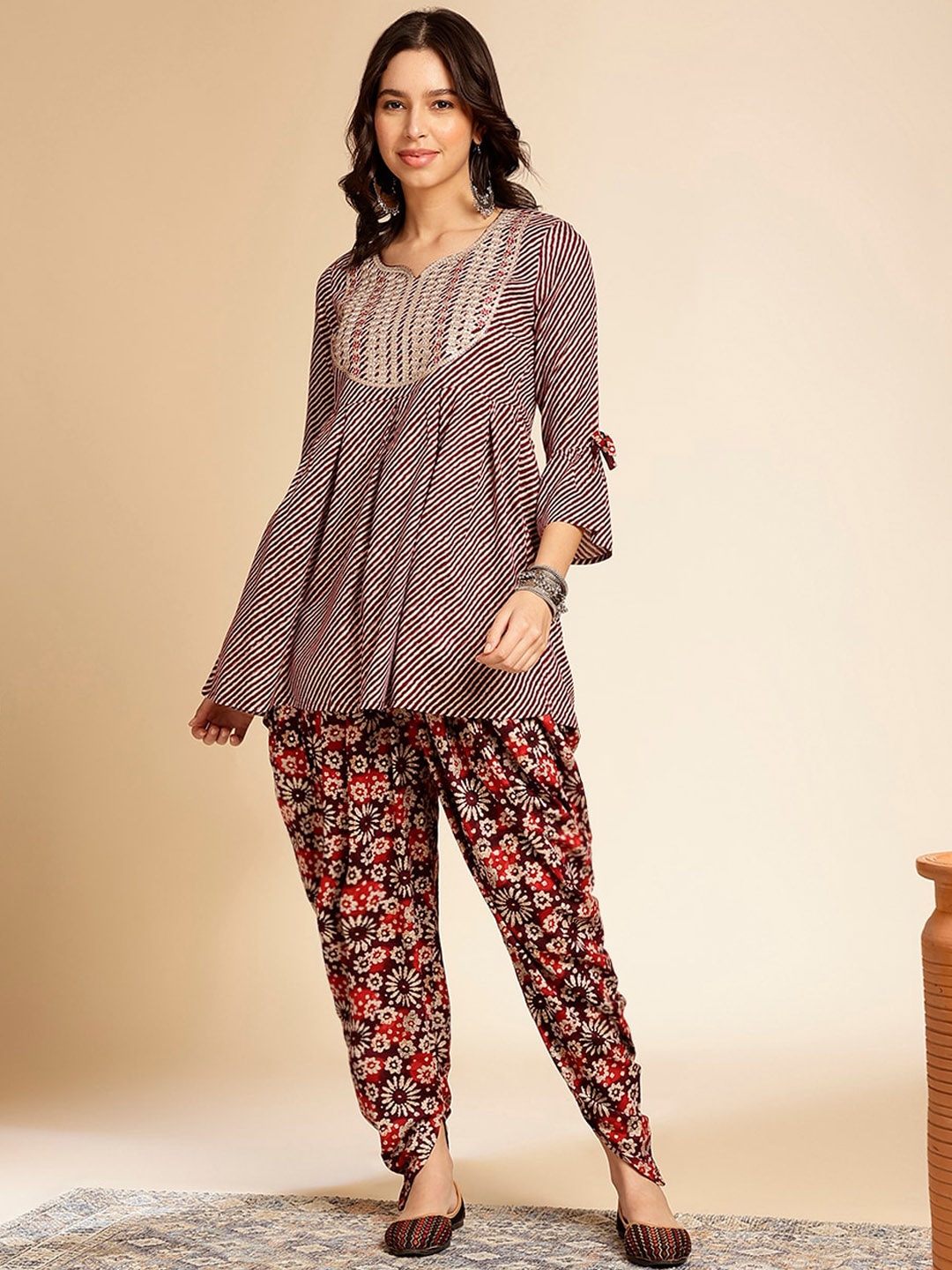 

Anouk Ethnic Motifs Embroidered Regular Thread Work A-Line Kurti with Dhoti Pants, Magenta