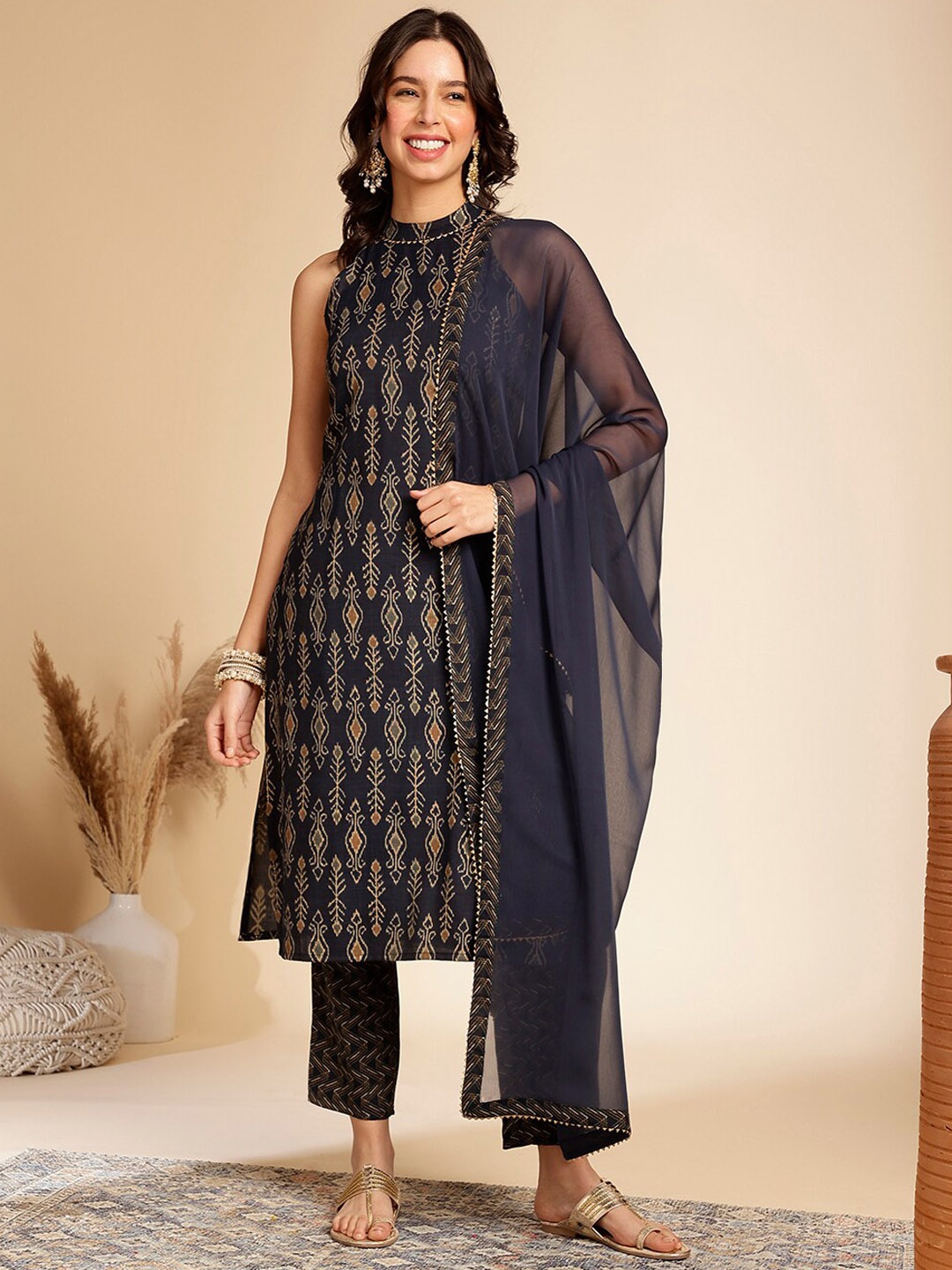 

Anouk Ethnic Motifs Printed Regular Halter Neck Gotta Patti Kurta with Trousers & Dupatta, Navy blue