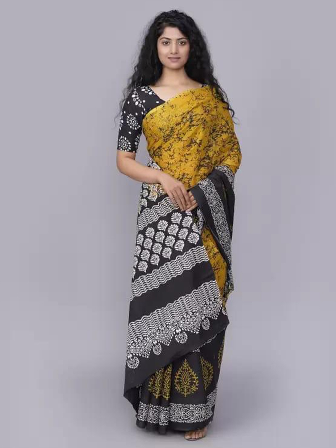 

TROPWEAR Batic Printed Pure Cotton Saree, Yellow