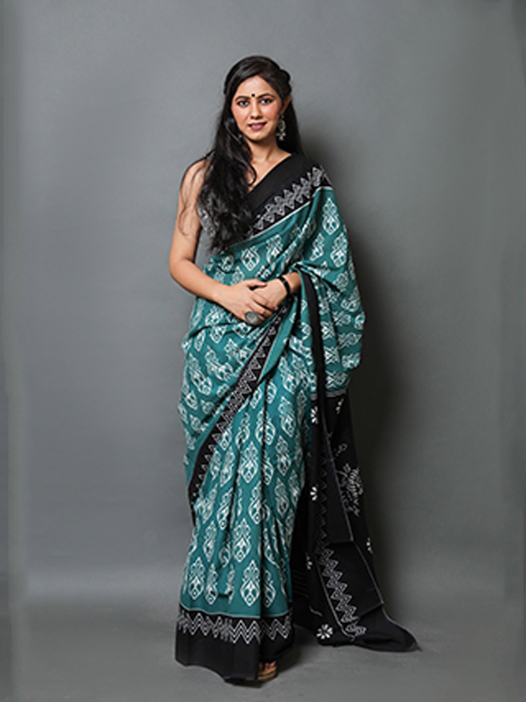 

Sanganeri Print Ethnic Motifs Printed Pure Cotton Ikat Saree, Turquoise blue