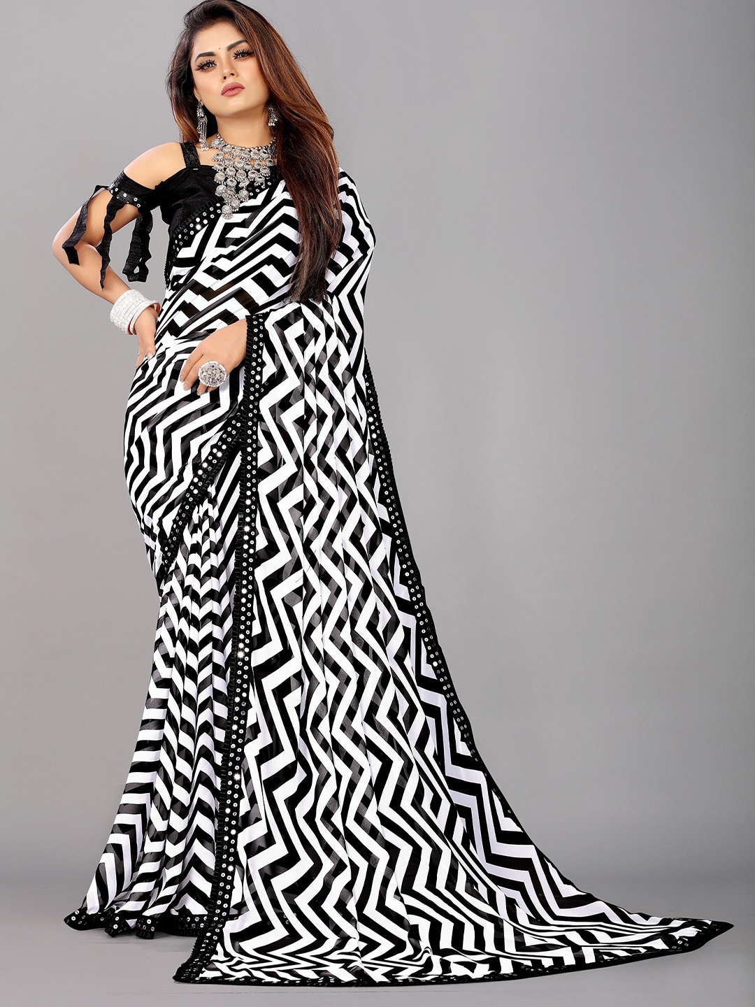 

Reeta Fashion Chevron Printed Sequinned Pure Georgette Saree, Black