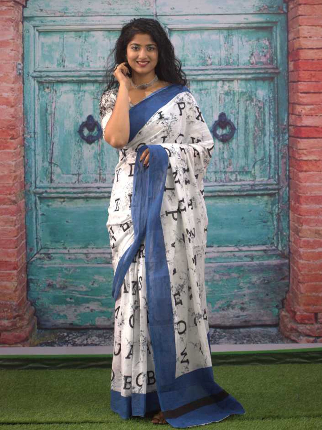 

JAIPURI BLOCK PRINT Typography Printed Ikat Saree, Blue