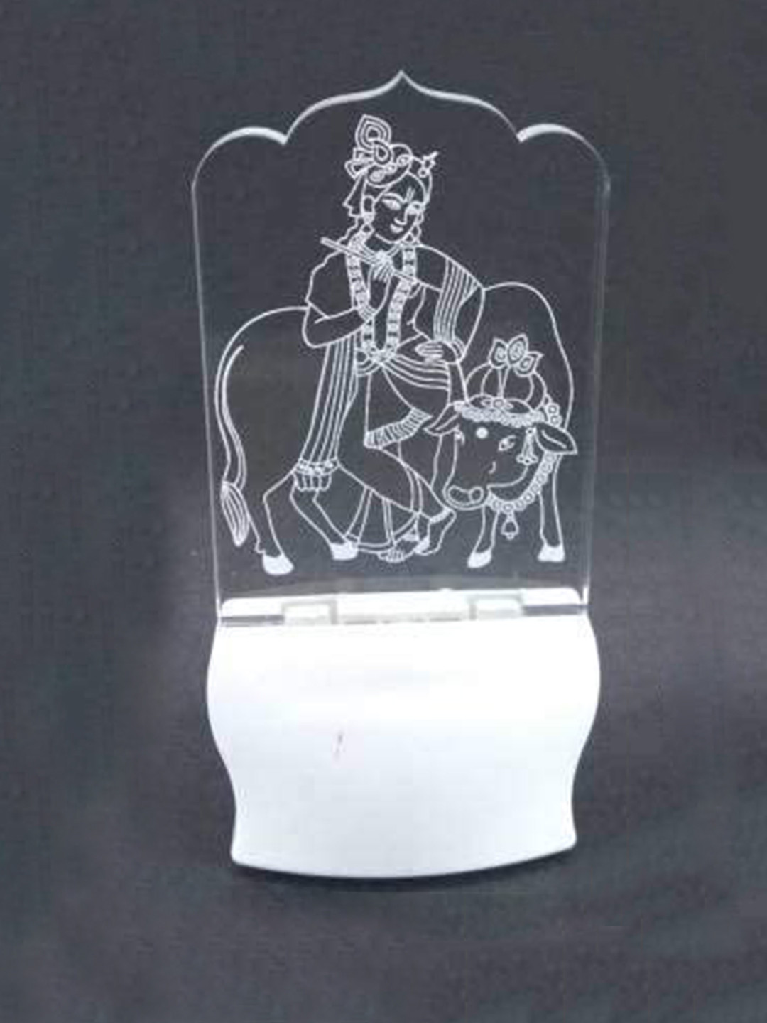 

NMII White & Transparent Printed Shri Krishana Acrylic 3D Illusion Plug Night Lamp