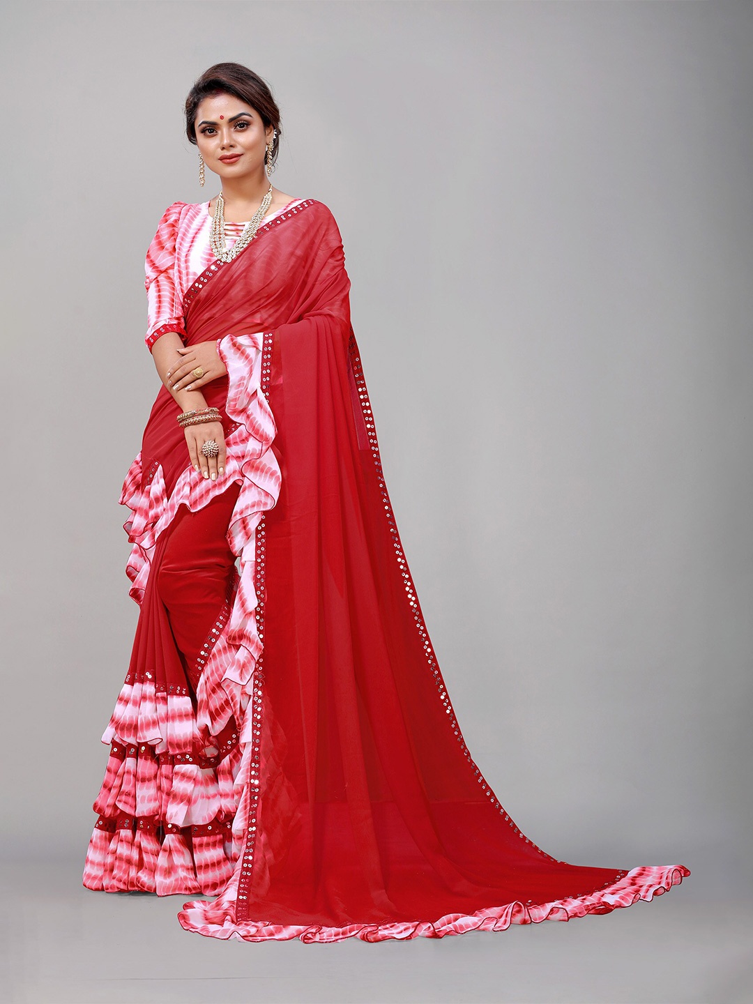 

Reeta Fashion Sequinned Ruffles Pure Georgette Saree, Maroon
