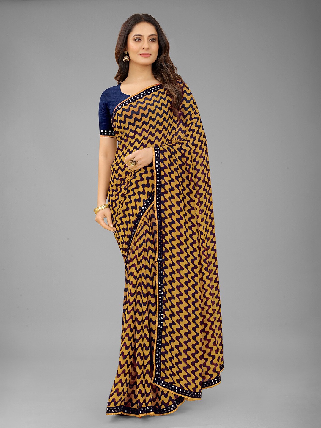 

Reeta Fashion Striped Mirror Work Pure Georgette Saree, Yellow
