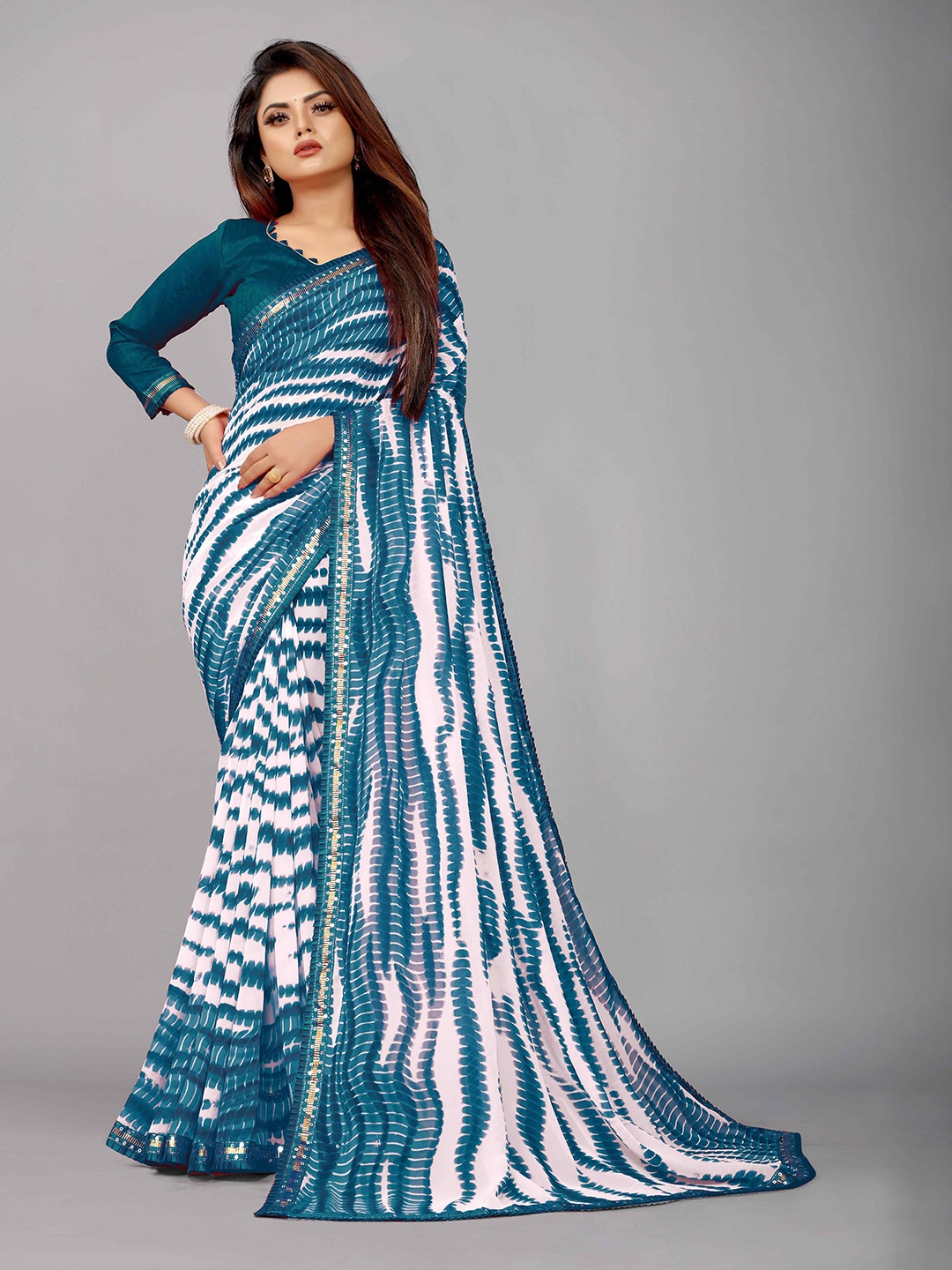 

Reeta Fashion Abstract Printed Pure Georgette Saree, Teal