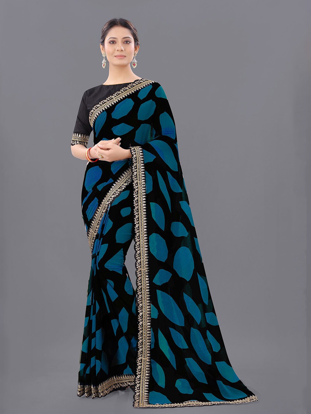 

Reeta Fashion Beads and Stones Pure Georgette Saree, Blue