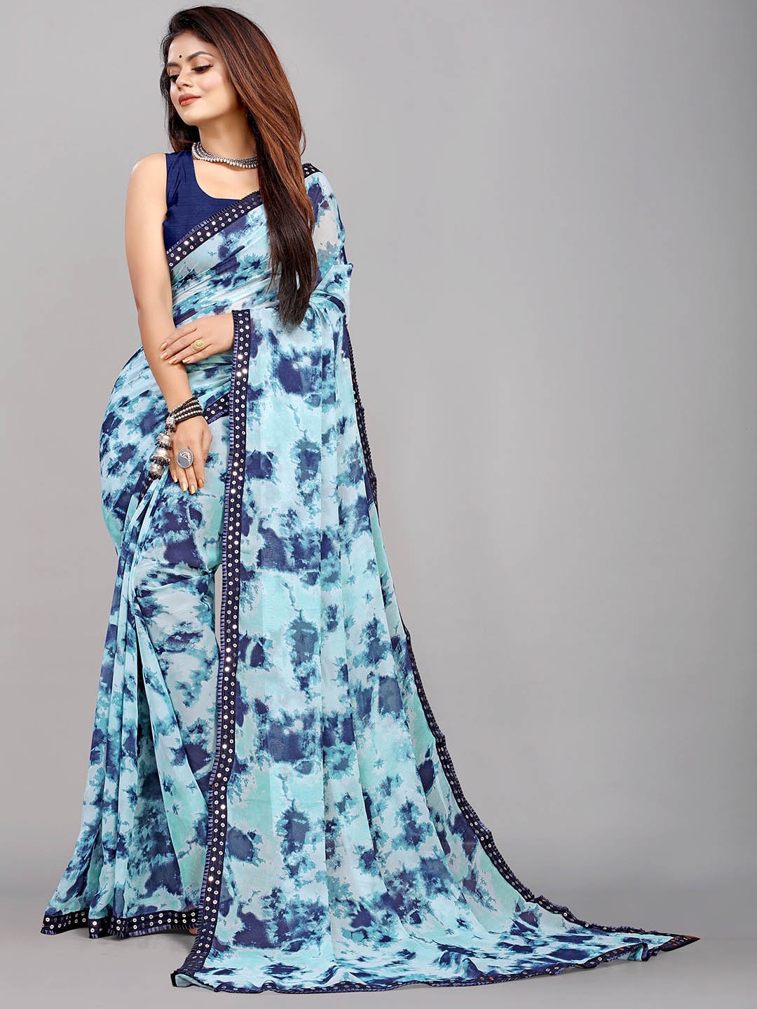 

Reeta Fashion Abstract Printed Sequined Pure Georgette Saree, Blue