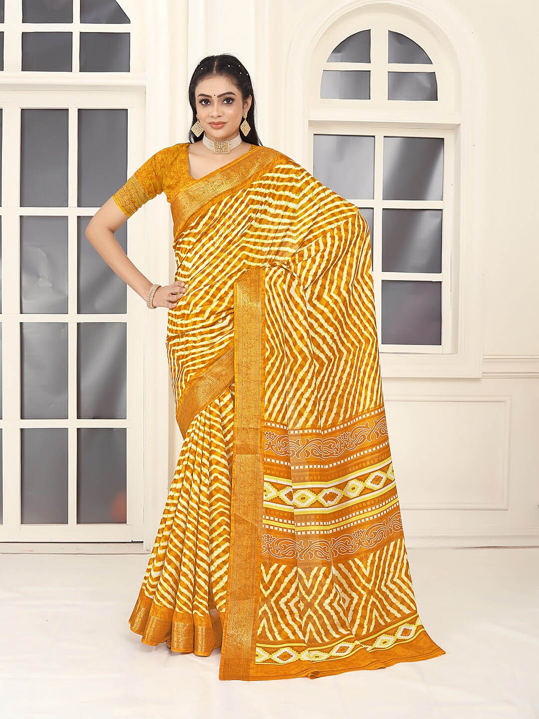

Pionex Striped Zari Leheriya Saree, Yellow